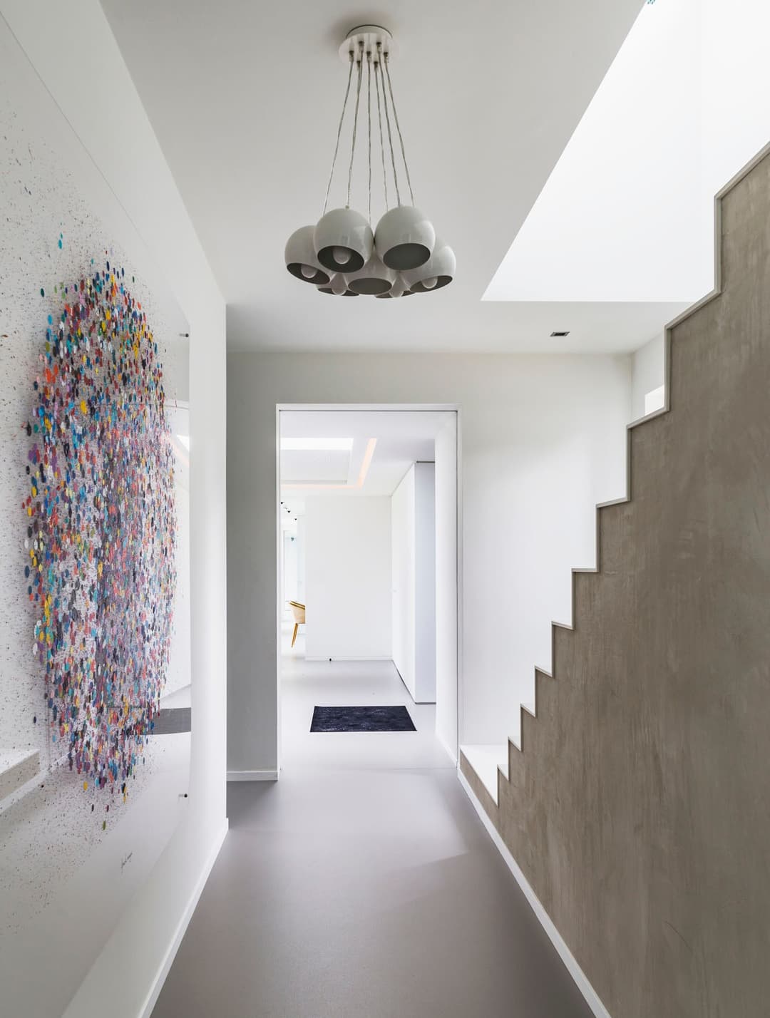 sliding pocket door in a minimalist hallway