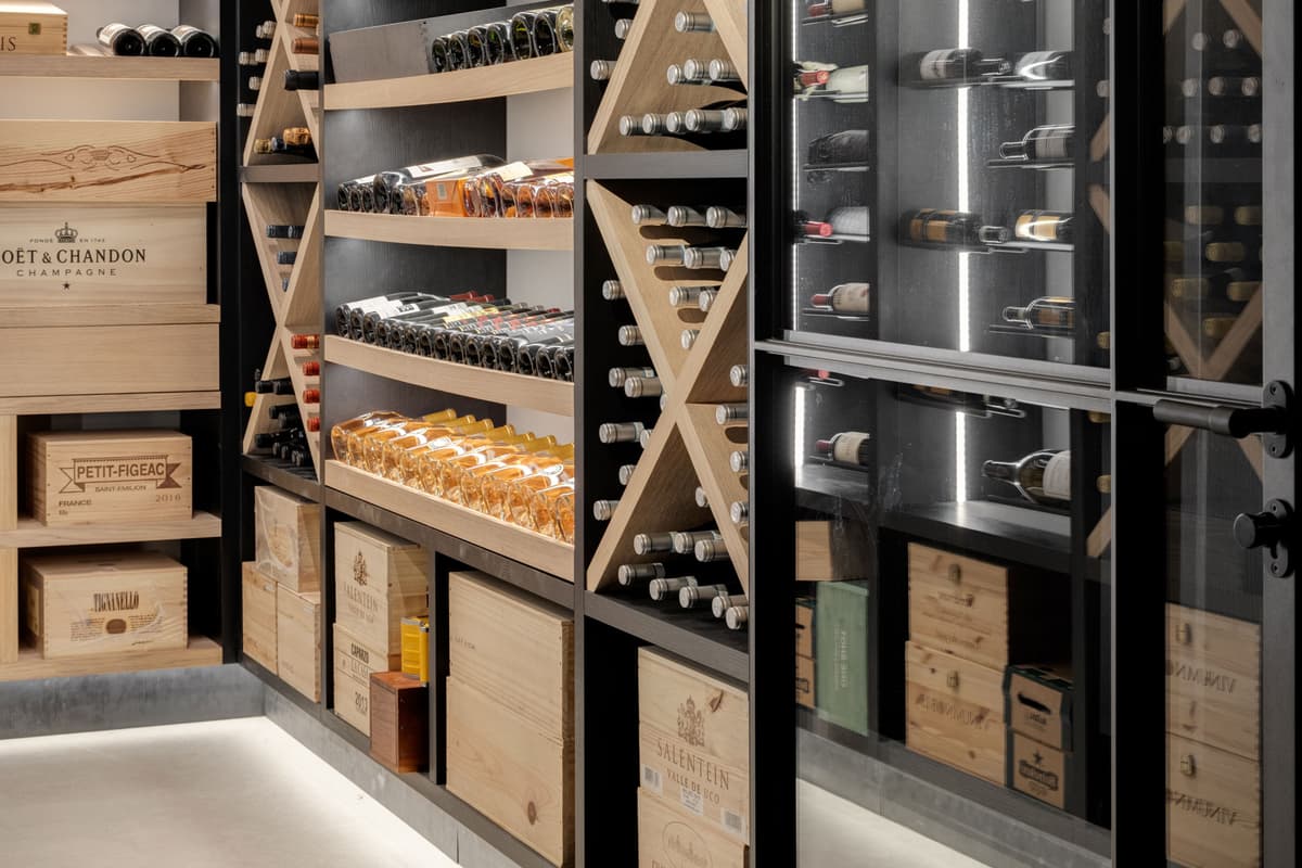 walk-in wine cabinet or cellar with steel glazed doors in a jet black finish