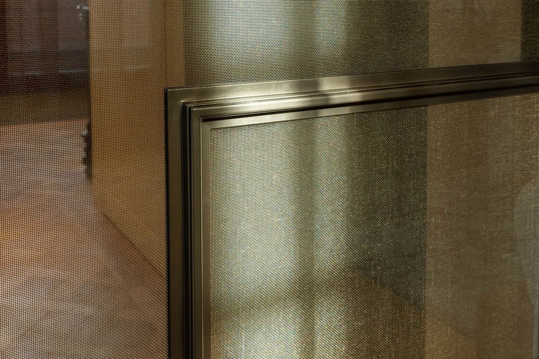 metal inlay glass in a steel glazed door design for high-end interior and architect projects