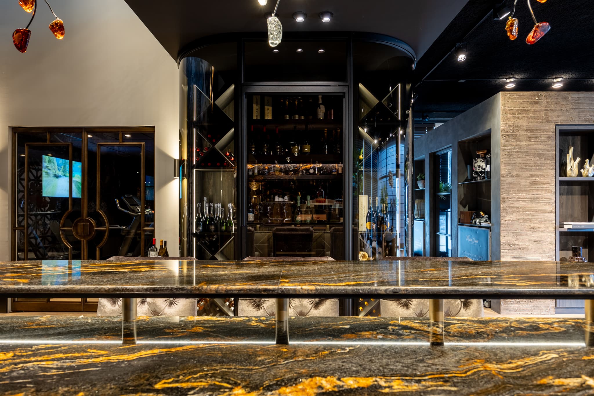 wine cabinet with curved steel glazed doors in a jet black finish